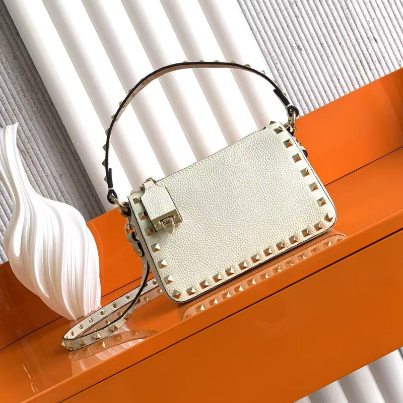 Elegantna ženska kožna crossbody torbica s preklopnim zatvaranjem, s jednom naramenicom, unutarnja podstava od prave goveđe kože, džep za telefon
