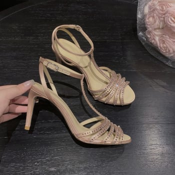 Ženske satenske sandale s visokim tankim petama, okrugli vrh, kopča (Gornji materijal: satenski; Oblik vrha: okrugli; Visina pete: >8 cm; Stil pete: tanak; Zatvaranje: kopča)