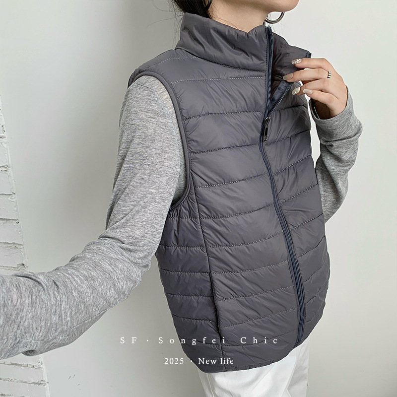 Női nylon termo mellény fél-állú galléval, vast anyag 251–300 g/m², cipzáras záródás, melegen tart és biztosít hátsó védelmet, ideális rétegezéshez kültéren