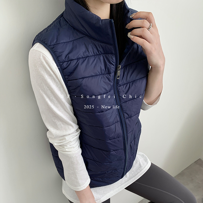 Női nylon termo mellény fél-állú galléval, vast anyag 251–300 g/m², cipzáras záródás, melegen tart és biztosít hátsó védelmet, ideális rétegezéshez kültéren