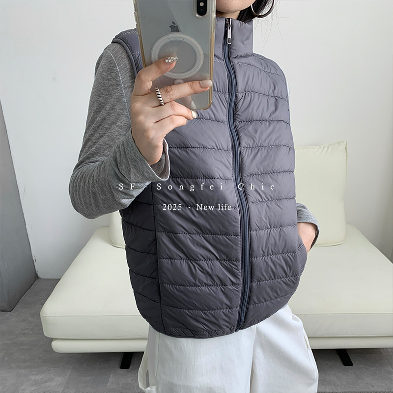 Női nylon termo mellény fél-állú galléval, vast anyag 251–300 g/m², cipzáras záródás, melegen tart és biztosít hátsó védelmet, ideális rétegezéshez kültéren