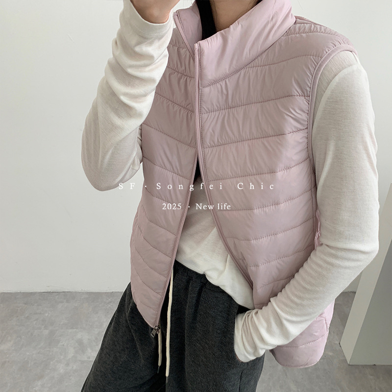 Női nylon termo mellény fél-állú galléval, vast anyag 251–300 g/m², cipzáras záródás, melegen tart és biztosít hátsó védelmet, ideális rétegezéshez kültéren