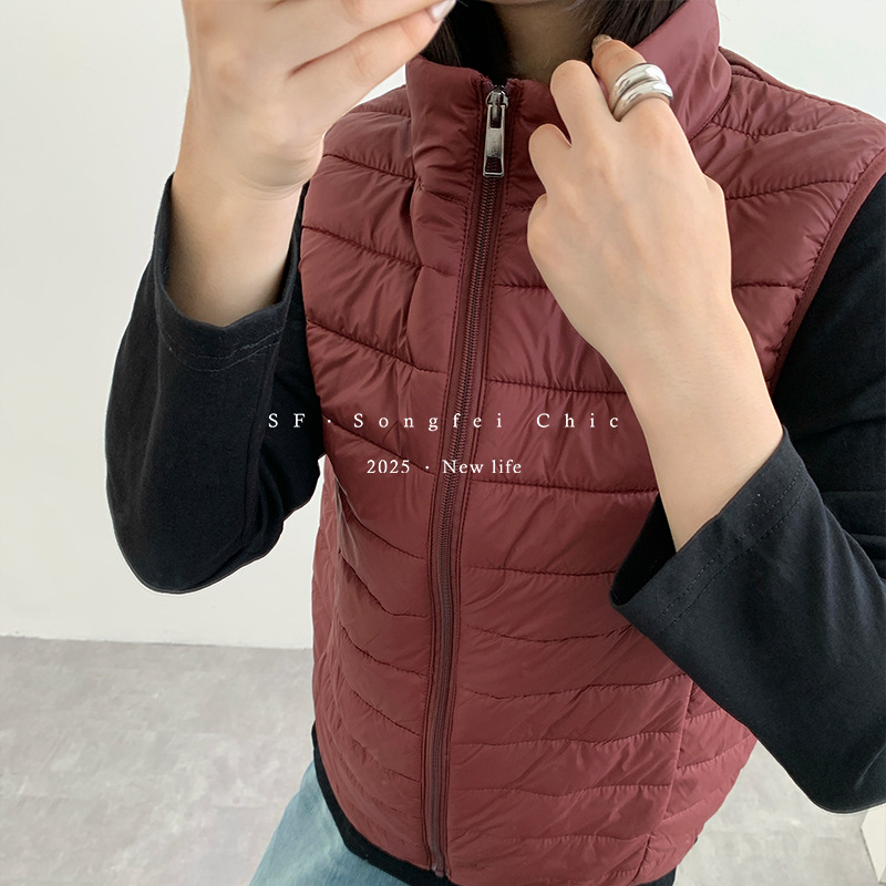 Női nylon termo mellény fél-állú galléval, vast anyag 251–300 g/m², cipzáras záródás, melegen tart és biztosít hátsó védelmet, ideális rétegezéshez kültéren