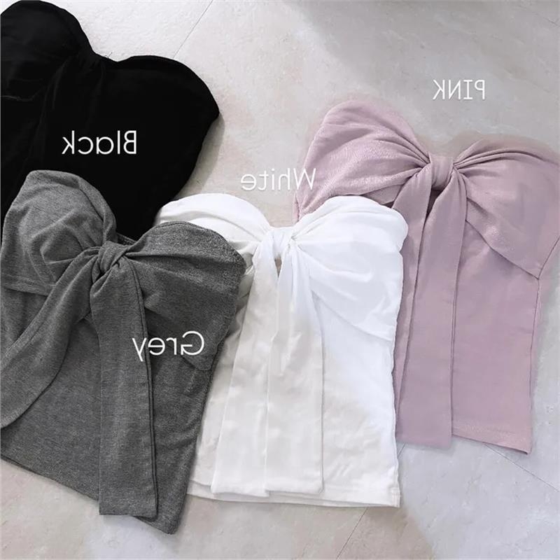 Top scurt pentru femei, talie înaltă, șnur, bretele neremovabile, lungime 40–50 cm, țesătură din bumbac, conținut 50–70% bumbac.