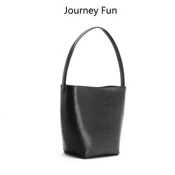 Γυναικεία τσάντα τύπου bucket από δέρμα βοδινού πρώτου στρώματος, μαλακή υφή με επένδυση πολυεστέρα, εσωτερική θήκη για τηλέφωνο