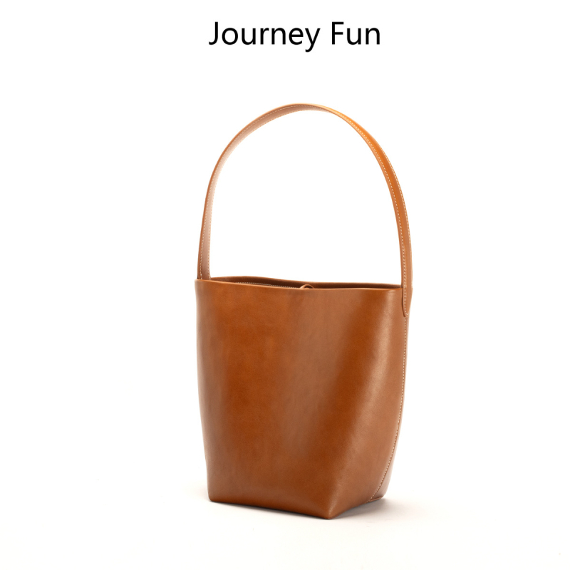 Γυναικεία τσάντα τύπου bucket από δέρμα βοδινού πρώτου στρώματος, μαλακή υφή με επένδυση πολυεστέρα, εσωτερική θήκη για τηλέφωνο