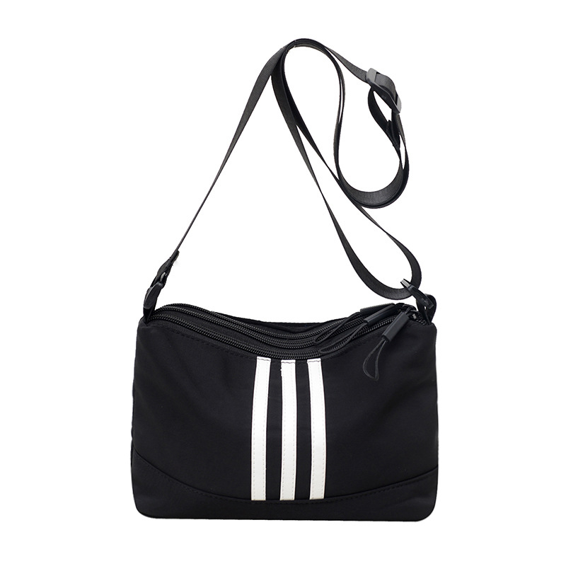 Ženska crossbody torbica od najlona, kvadratnog oblika, velike kapacitete, zatvaranje na zatvarač, unutarnja džep s zatvaračem, podstava od poliester, s jednom naramenicom