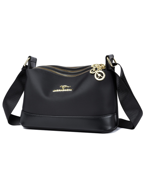 Ženska crossbody torba od Oxford platna, horizontalno kvadratnog oblika, zatvaranje na zip, poliester podstava, unutarnji džepovi: džep sa zipom, džep za telefon i džep za ID
