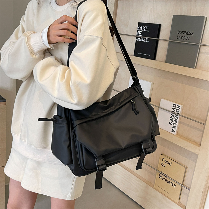 Unisex crossbody torba – Oxford materijal, zatvaranje na šnuru, horizontalni kvadratni oblik, unutarnja pretinica za mobitel, poliester podstava
