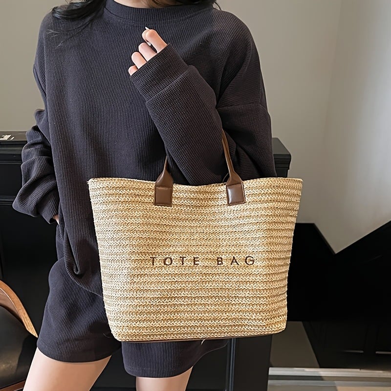 Torba tote od slame s izvezenim slovima, gradski minimalistički stil (materijal: slama; vodoravni kvadratni oblik; magnetsko zatvaranje; unutarnja džep sa zipom)