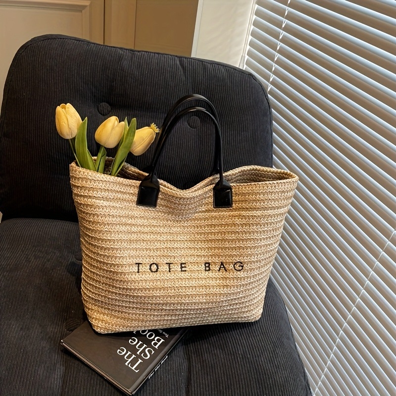 Torba tote od slame s izvezenim slovima, gradski minimalistički stil (materijal: slama; vodoravni kvadratni oblik; magnetsko zatvaranje; unutarnja džep sa zipom)