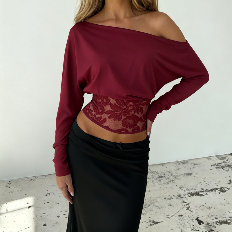 Szabálytalan ferde vállú felső kivágott csipke betéttel, bat-stílusú ujjak, derekat szorító fazon, hosszúujjú