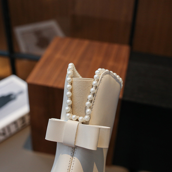 Dječje dječje modne čizme za zimu — gornji dio Ultrafilm koža; podstava od umjetne vune; potplat TPR; stražnji zatvarač; niski cilindrični dio