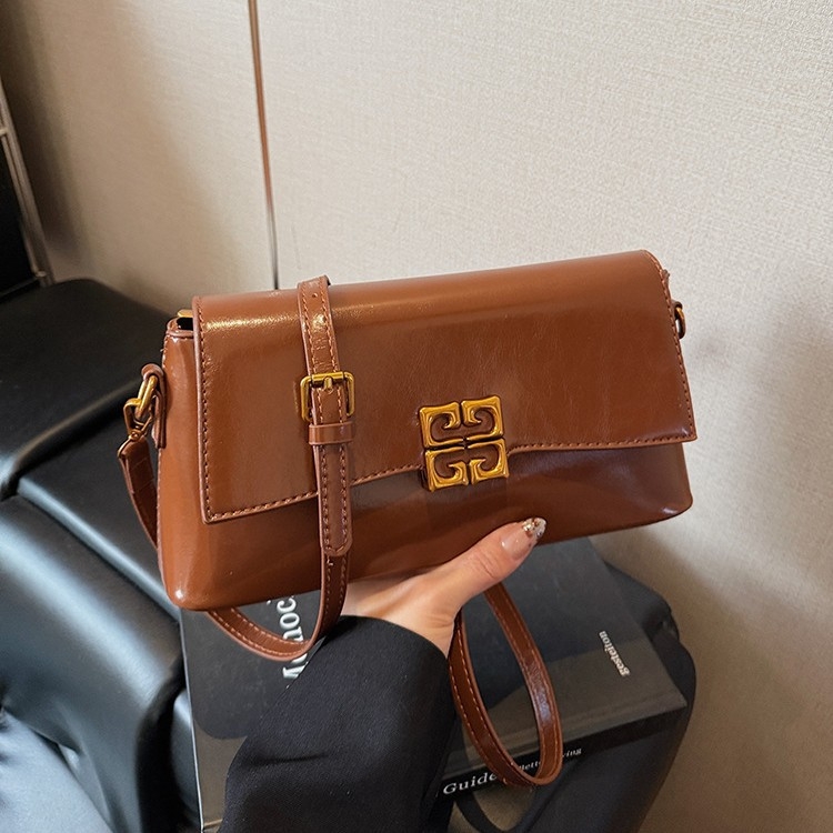 Ženska crossbody torbica, horizontalni kvadratni oblik, PU materijal, zatvaranje na poklopac, džep za mobitel, jedna naramenica, gradski minimalistički stil, svakodnevna upotreba
