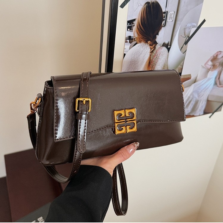 Ženska crossbody torbica, horizontalni kvadratni oblik, PU materijal, zatvaranje na poklopac, džep za mobitel, jedna naramenica, gradski minimalistički stil, svakodnevna upotreba