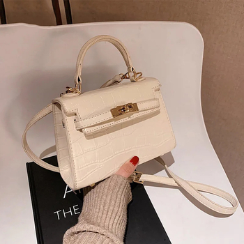 Ženska PU crossbody torba, vertikalni kvadratni oblik, zatvaranje zaklopkom, unutarnji džepovi: zip, džep za telefon, džep za osobnu iskaznicu, jedan remen za ramena