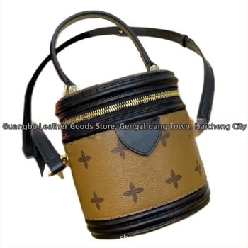 Γυναικεία κυλινδρική τσάντα bucket με mini print, PVC, επένδυση πολυεστέρα, κλείσιμο με φερμουάρ, εσωτερικό διαμέρισμα με φερμουάρ και θήκη για κινητό