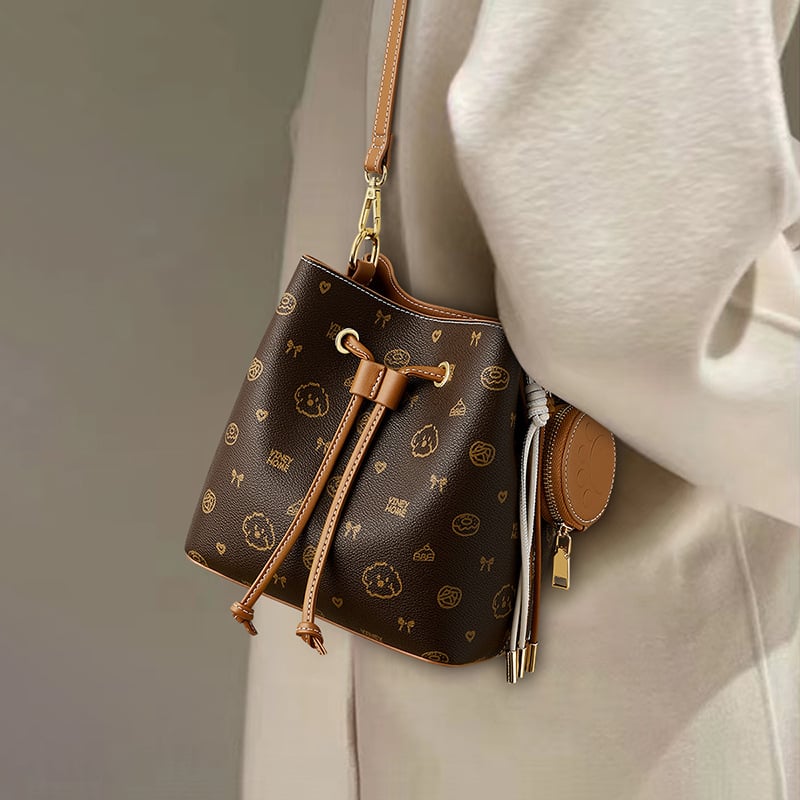 Γυναικεία bucket τσάντα, street style, συνθετικό δέρμα, bucket σχήμα, εσωτερική θήκη για κινητό, κυκλοφορία χειμώνας 2025