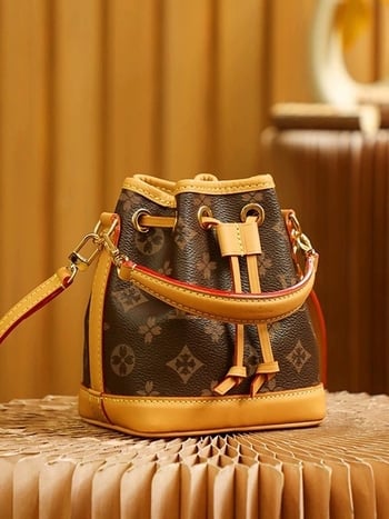 Τσάντα τύπου κουβά από γνήσιο δέρμα με κορδόνι κλεισίματος, καμβάς επένδυση, αστικός μινιμαλισμός