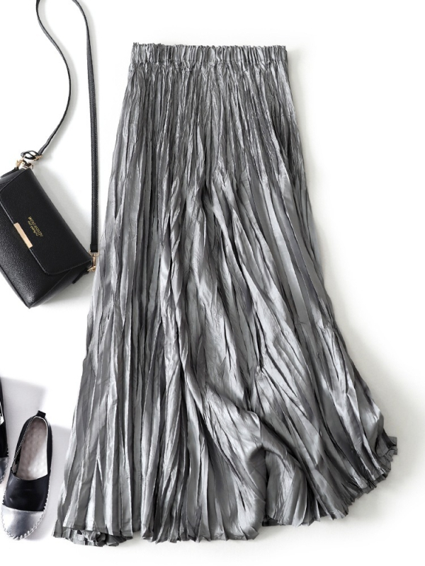 Plisirana midi suknja, perlatni sjaj završnice, lagana poliester tkanina, srednja duljina, elegantan stil