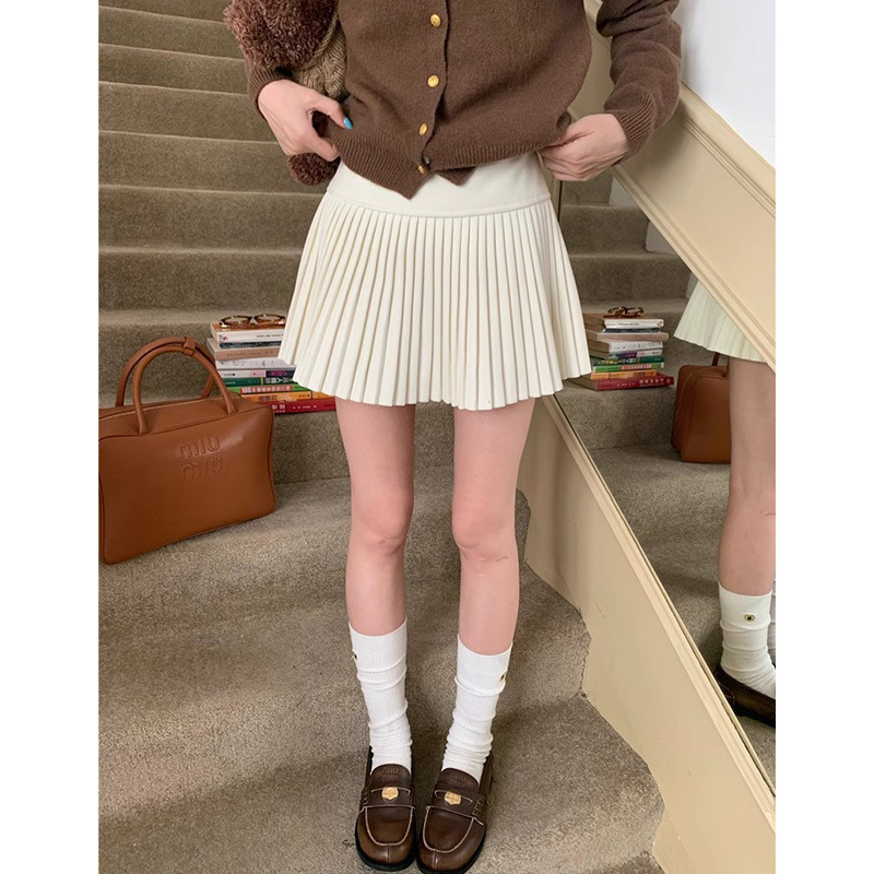 Fustă plisată scurtă, talie înaltă, croi A, țesătură din lână