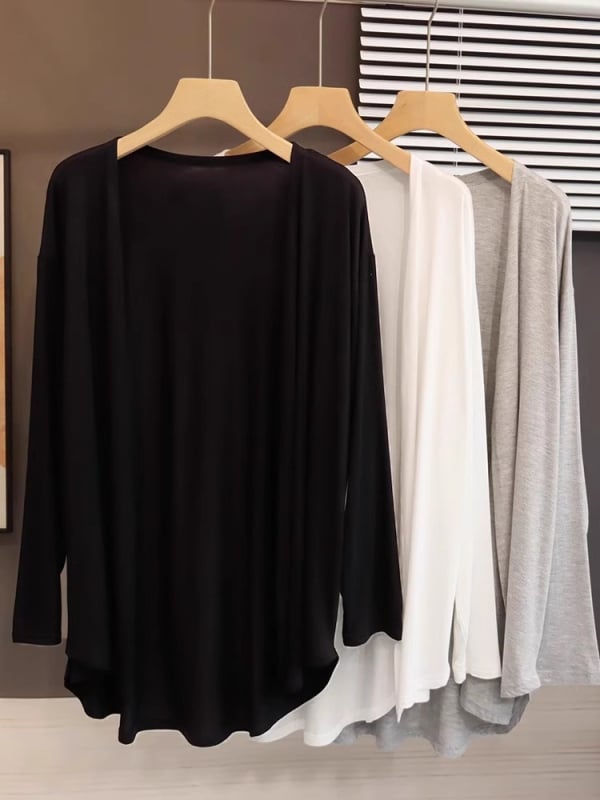 Свободен кардиган от полиестер с дълги ръкави, средна дължина, едноцветен.