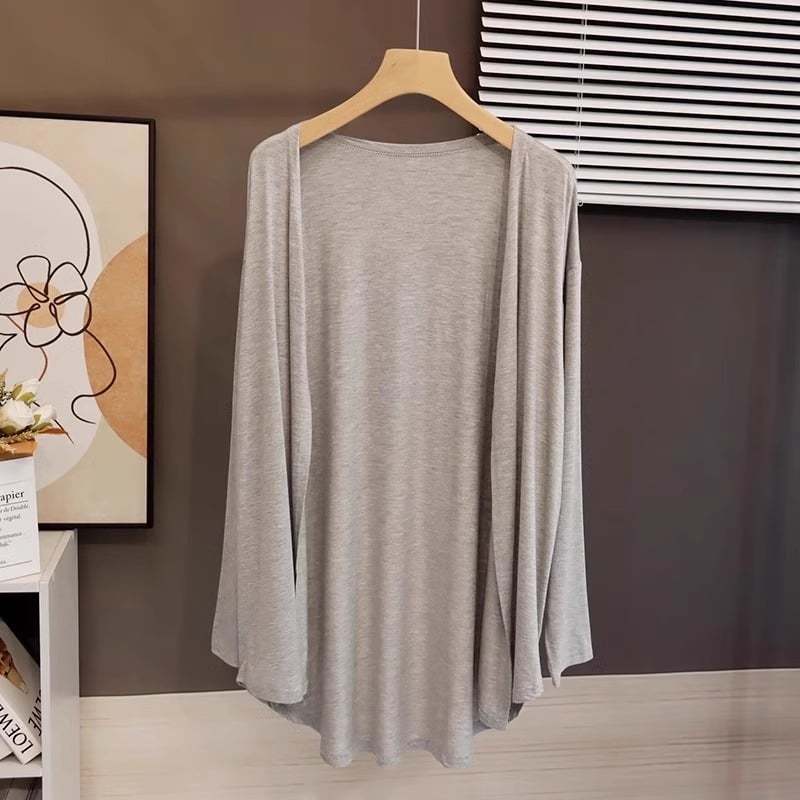 Свободен кардиган от полиестер с дълги ръкави, средна дължина, едноцветен.