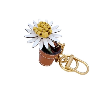 Ръчно изработен ключодържател от кравешка кожа с маргаритка в саксия