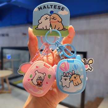 Ключодържател с мило линейно кученце в ретро преносима игрова конзола, индивидуално опакован – подходящ като бизнес подарък