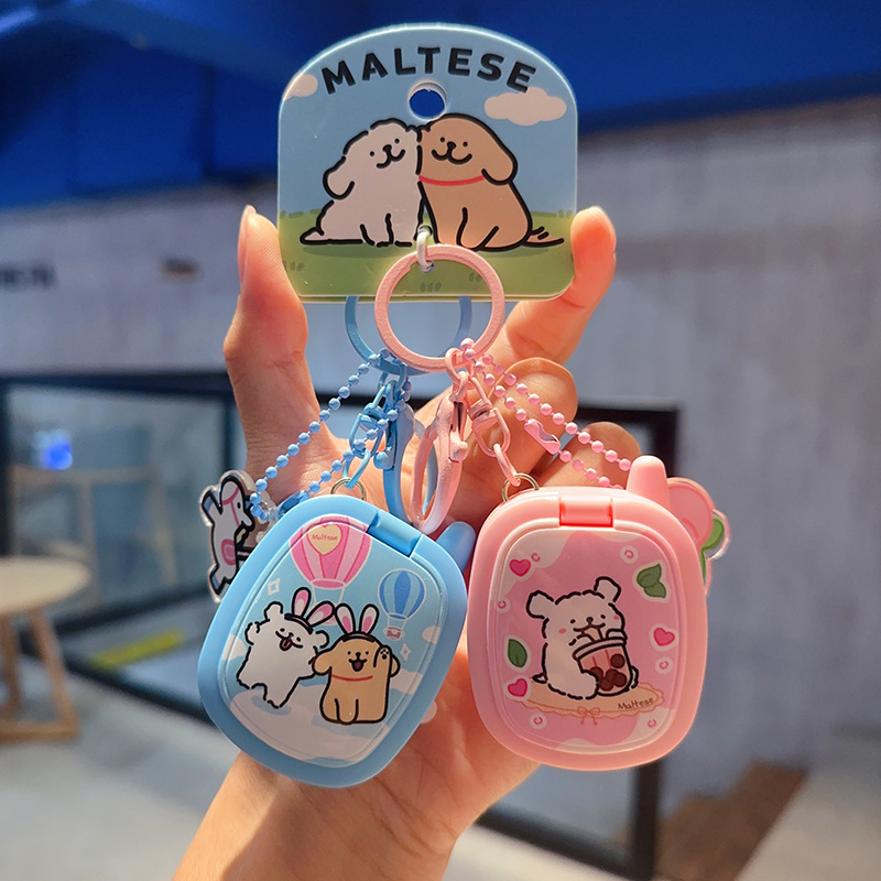 Ключодържател с мило линейно кученце в ретро преносима игрова конзола, индивидуално опакован – подходящ като бизнес подарък