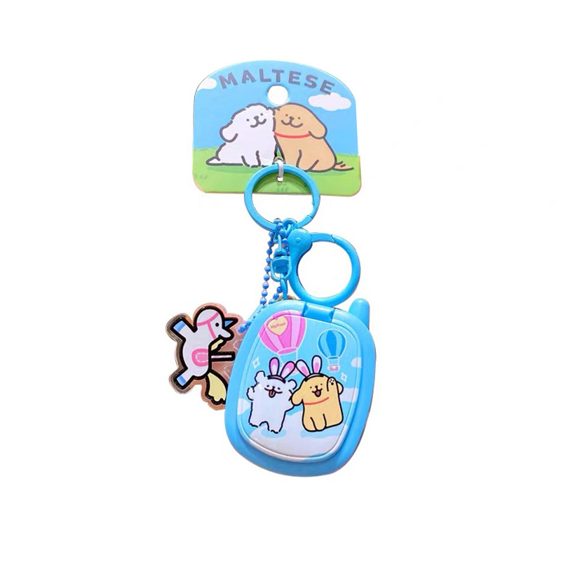 Ключодържател с мило линейно кученце в ретро преносима игрова конзола, индивидуално опакован – подходящ като бизнес подарък