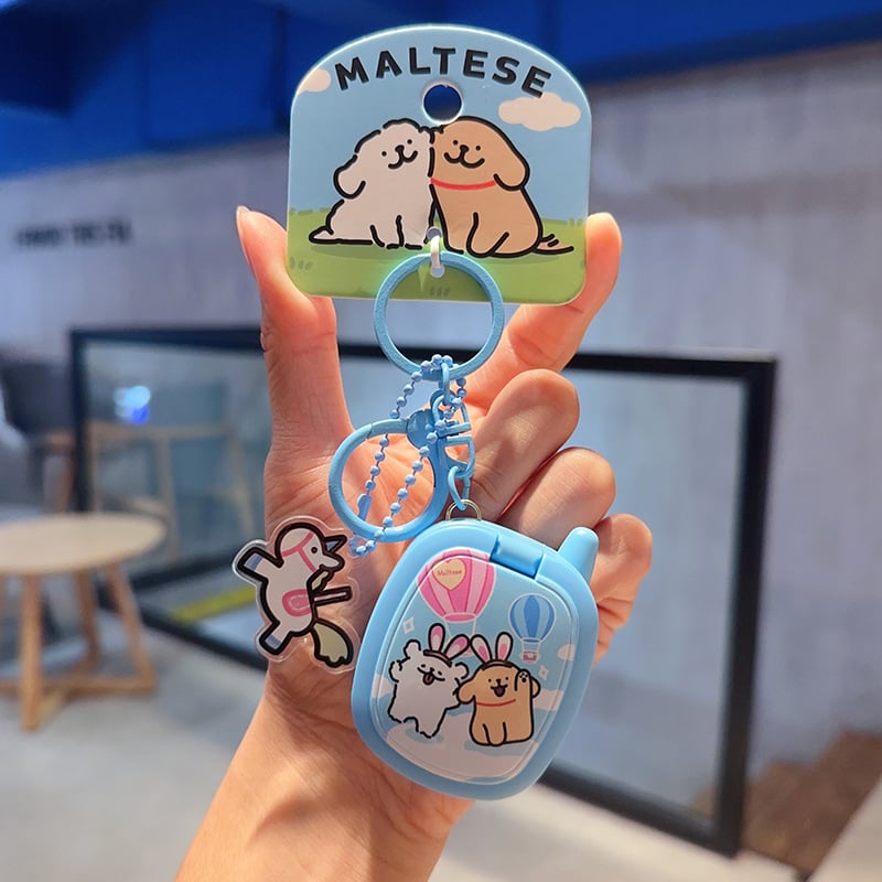 Ключодържател с мило линейно кученце в ретро преносима игрова конзола, индивидуално опакован – подходящ като бизнес подарък