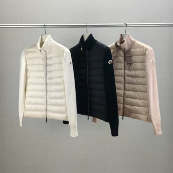 Пухено яке със стойкова яка, цип за закопчаване; Пълнеж: пух; Съдържание на пуха: 76–80%; Материя: вълна