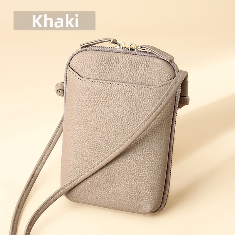 Női mobiltelefon táska keresztpánttal, valódi bőr, első réteg marha bőréből, cipzáras nyitás, függőleges négyzetes forma, belső cipzáras rekesz és kártyatartóhelyek