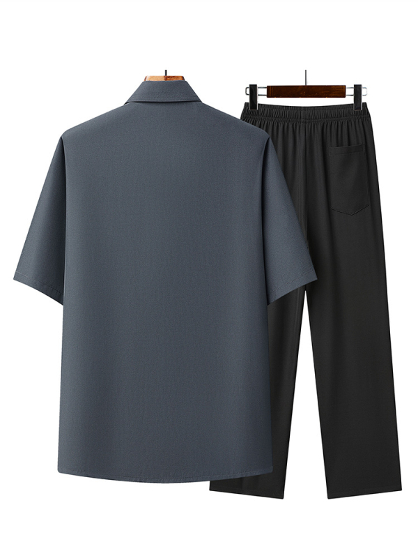 Риза с тесен силует, къс ръкав, яка тип лафел, полиестерна тъкан, едноцветен модел