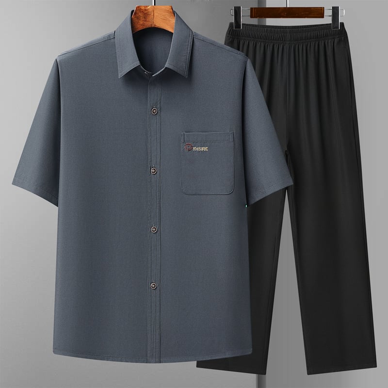 Риза с тесен силует, къс ръкав, яка тип лафел, полиестерна тъкан, едноцветен модел