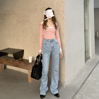 Ženske traperice – visok struk; blago šire; izblijedjeli denim; 70–80% pamuk, 30% poliester