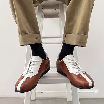 Férfiaknak tervezett bőr casual sneaker – első réteg marhabőr felsőrész, gumitalp, négyszögletes orr, alacsony sarok 1–3 cm, elöl fűző