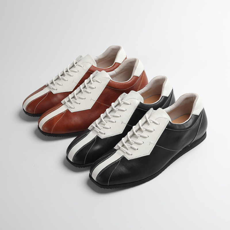 Férfiaknak tervezett bőr casual sneaker – első réteg marhabőr felsőrész, gumitalp, négyszögletes orr, alacsony sarok 1–3 cm, elöl fűző