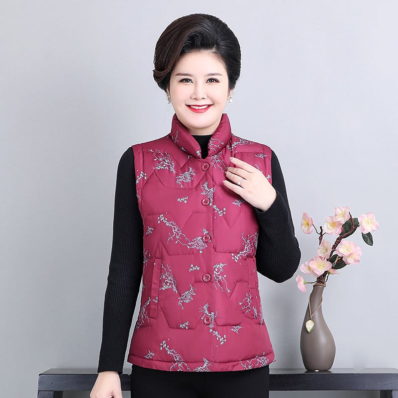 Vesta pentru femei cu guler înalt, umplere din bumbac, țesătură poliesterică 90–95%, croială lejeră, lungime 50–65 cm