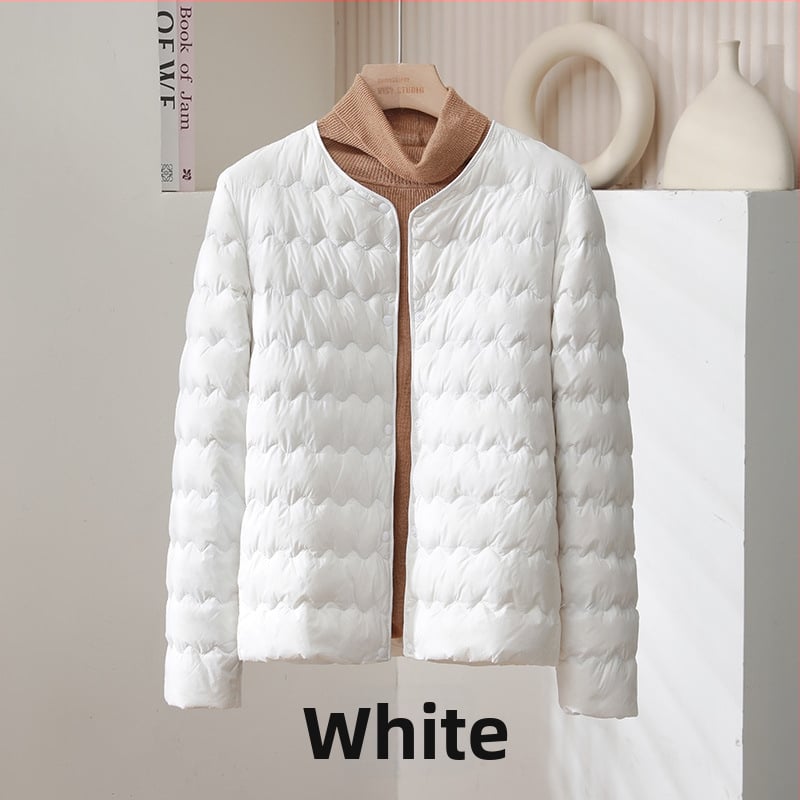 Дамско пухено яке, тънък силует, ултра къс модел (≤40 см), пълнено с пух от патица, съдържание на пера 51–55%