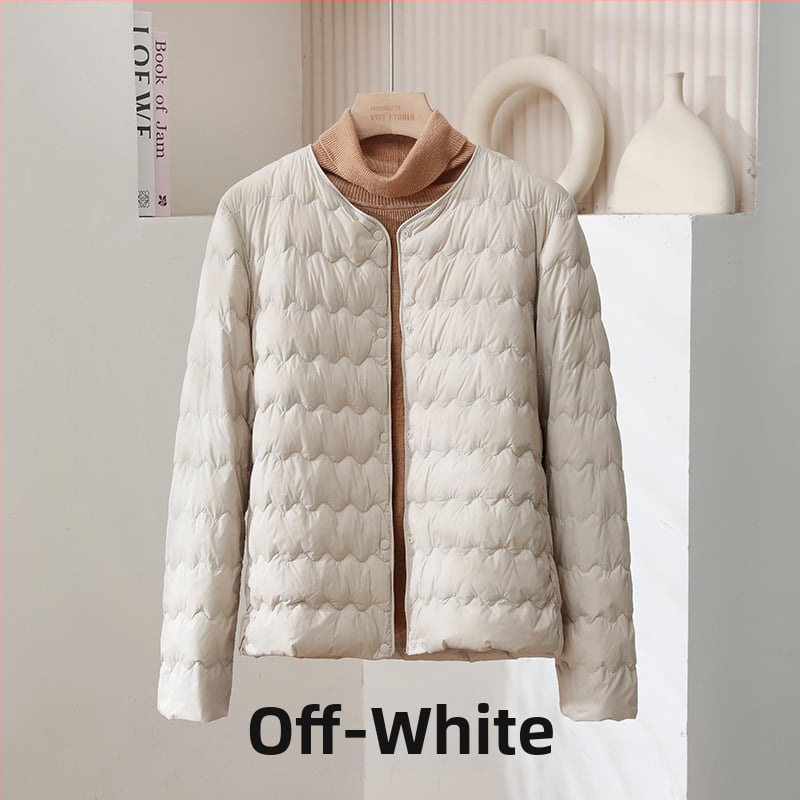 Дамско пухено яке, тънък силует, ултра къс модел (≤40 см), пълнено с пух от патица, съдържание на пера 51–55%