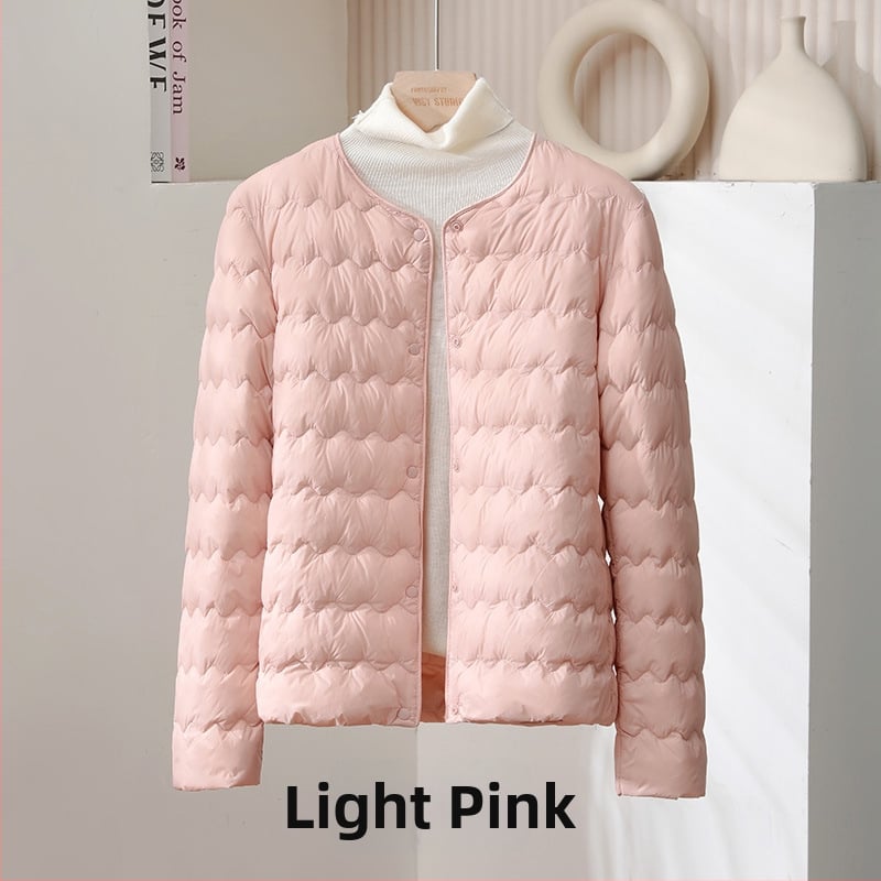 Дамско пухено яке, тънък силует, ултра къс модел (≤40 см), пълнено с пух от патица, съдържание на пера 51–55%