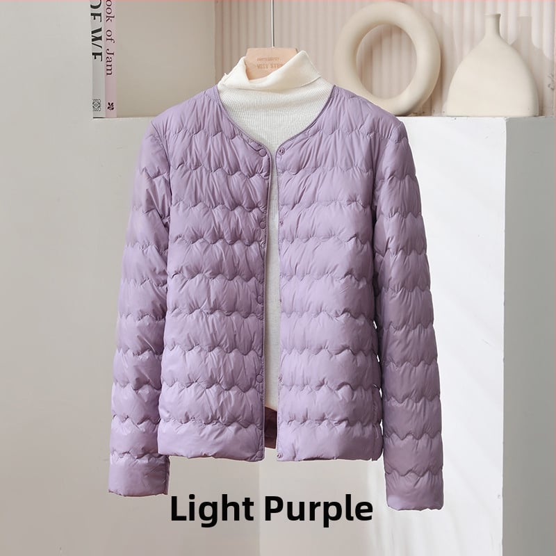 Дамско пухено яке, тънък силует, ултра къс модел (≤40 см), пълнено с пух от патица, съдържание на пера 51–55%