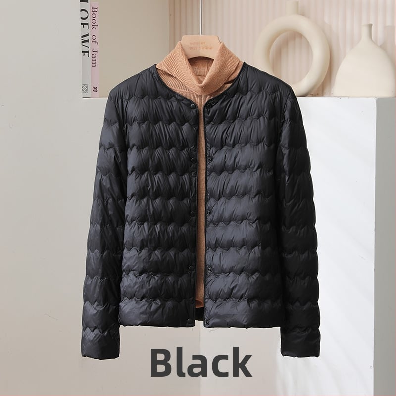 Дамско пухено яке, тънък силует, ултра къс модел (≤40 см), пълнено с пух от патица, съдържание на пера 51–55%