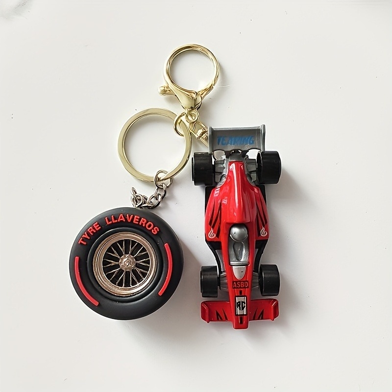 Ključni lanac od legure, karikaturan model automobila, s uzorkom gume (Materijal: legura; Oblik: privjesak za ključeve; Uzorak: guma; Obrada: simulacija)