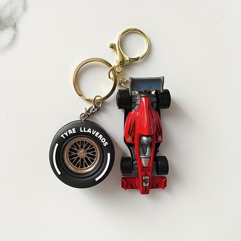 Ključni lanac od legure, karikaturan model automobila, s uzorkom gume (Materijal: legura; Oblik: privjesak za ključeve; Uzorak: guma; Obrada: simulacija)