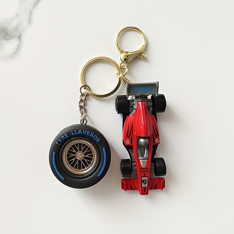 Ključni lanac od legure, karikaturan model automobila, s uzorkom gume (Materijal: legura; Oblik: privjesak za ključeve; Uzorak: guma; Obrada: simulacija)
