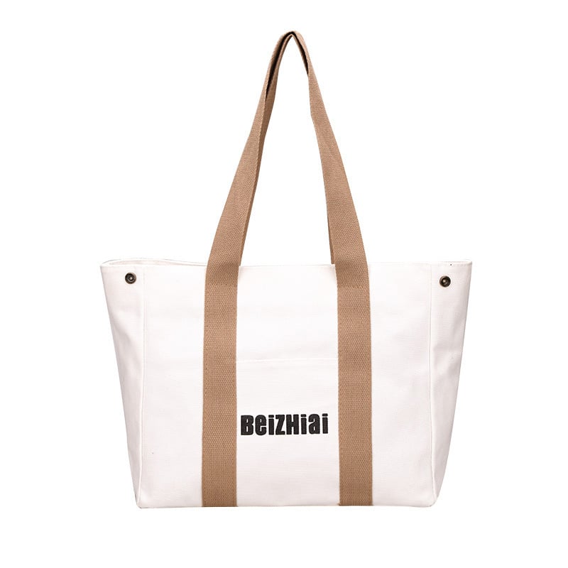 Geantă tote din pânză, în stil street, cu formă orizontală pătrată, închidere cu fermoar, buzunare interioare: buzunar cu fermoar, buzunar pentru telefon, buzunar pentru ID.