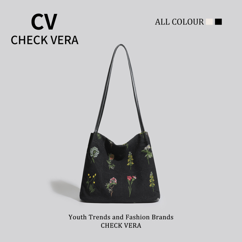 Torbica bucket tote od platna s crossbody remenom i skrivenim džepom na zip